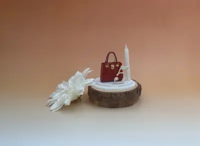 Sujet bougie sac à main