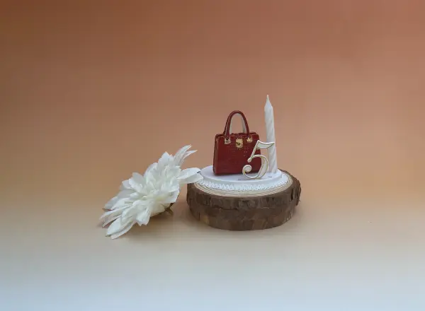 Sujet bougie sac à main